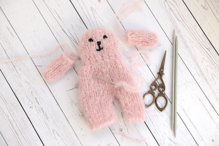 Making soft baby toy with yarnの写真素材