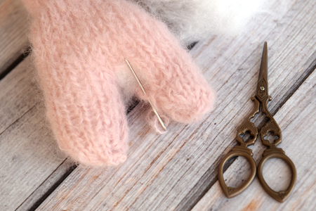 Making soft baby toy with yarnの写真素材