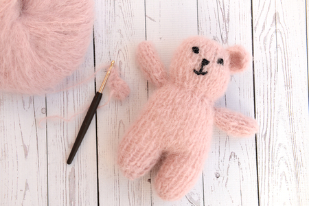 Making soft baby toy with yarnの写真素材