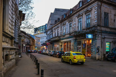 Streetlife with taxi in Bucharest, Romania. I have taken this photo in April 2018 during my visit of Romaniaのeditorial素材