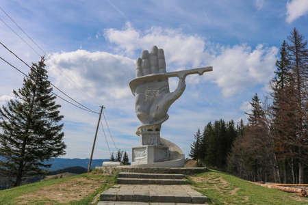 Pasul ciumarna hand statue in Bukovina. I have taken this photo in April 2018 during my visit of Romaniaのeditorial素材