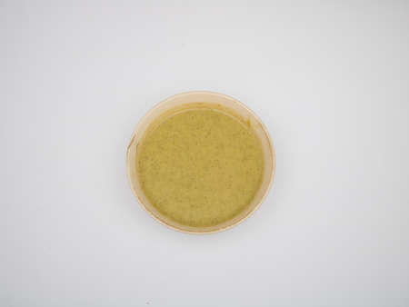 Simple broccoli soup isolated on a white backgroundの写真素材
