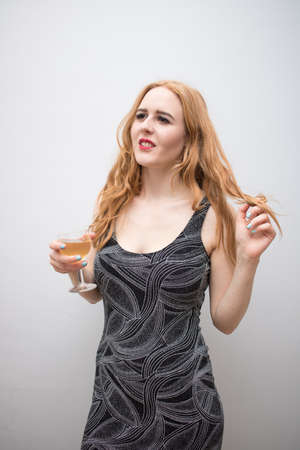 Beautiful long red health hair of young attractive woman isolated white background pink shirt zebra...