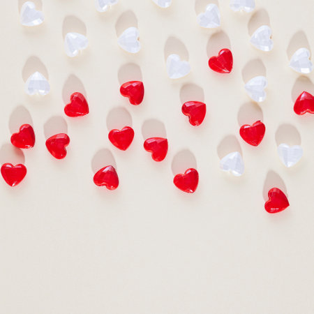 Gerber daisies flower square composition on flat lay light background with green leaves. Soft and simple design.の写真素材