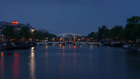 Skinny bridge over Amstel river - Amsterdamのeditorial素材