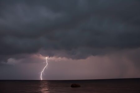 Thunder storm over the seaの写真素材