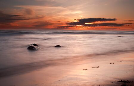 Beautiful sunset over the seaの写真素材