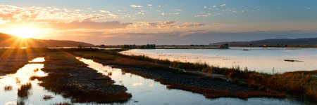 Beautiful sunset over Secovlje salt-pans in Slovenia.の写真素材