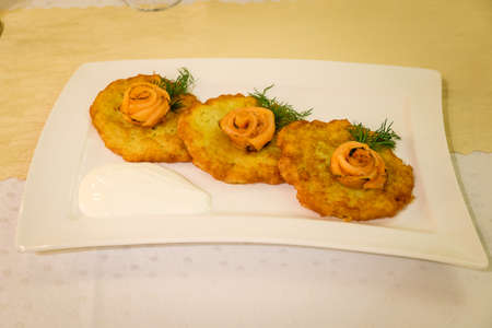 Potato pancakes with salmonの写真素材