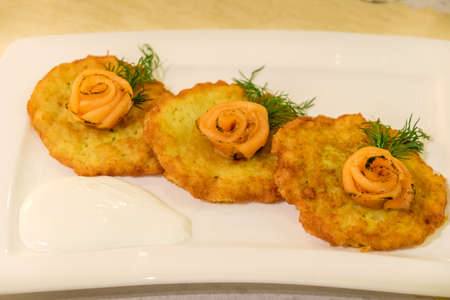 Potato pancakes with salmonの写真素材