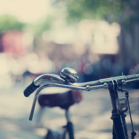 Vintage bicycle parked in the streetの写真素材