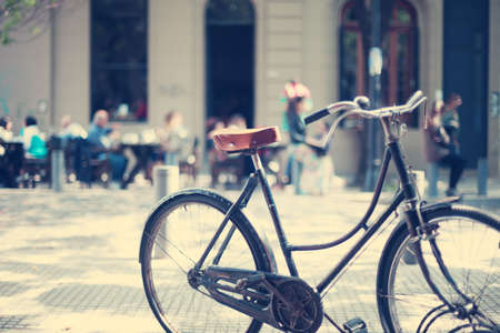 Vintage bicycle parked in the streetの写真素材