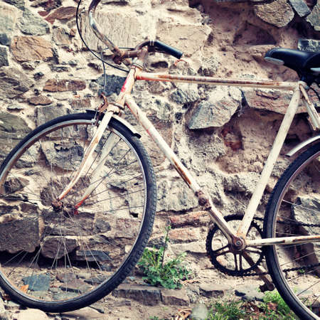 Vintage old pink bicycleの写真素材