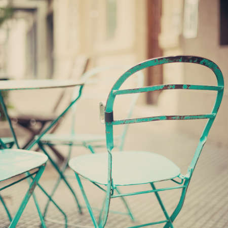 Outdoors cafe chairsの写真素材