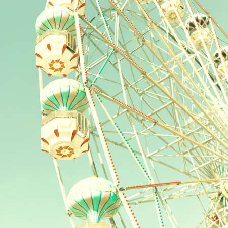 Vintage ferris wheel over turquoise skyの写真素材