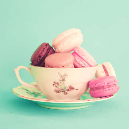 Macaroons in a tea cupの写真素材