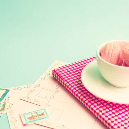Macaroons in a coffee cupの写真素材