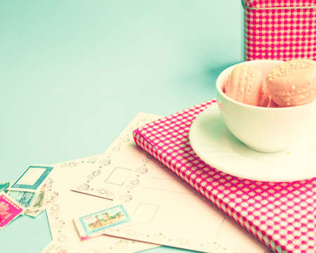Macaroons in a coffee cupの写真素材