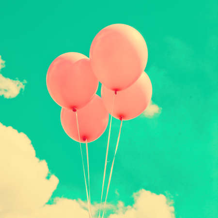 Vintage pink balloonsの写真素材
