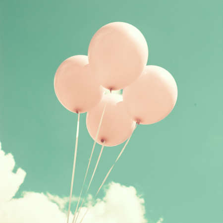 Four pink balloonsの写真素材