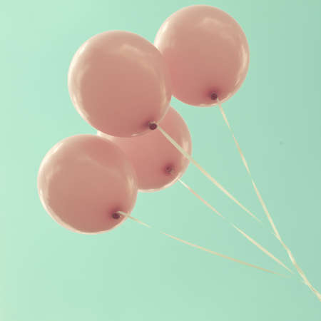 Four pink balloonsの写真素材