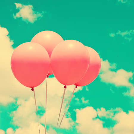 Four pink balloonsの写真素材