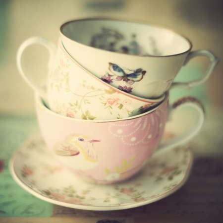 Pile of vintage tea cupsの写真素材