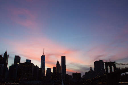 Manhattan skyline in a summer sunsetの写真素材
