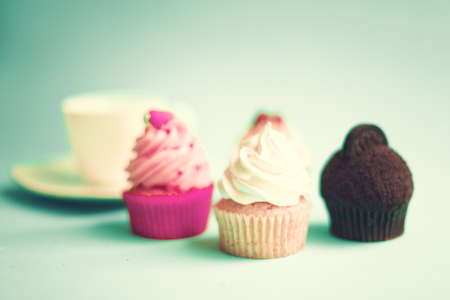 Cupcakes and tea cupの写真素材