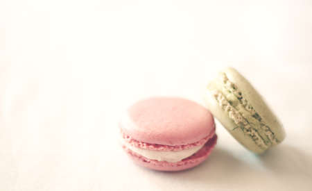 Two pastel macarons
