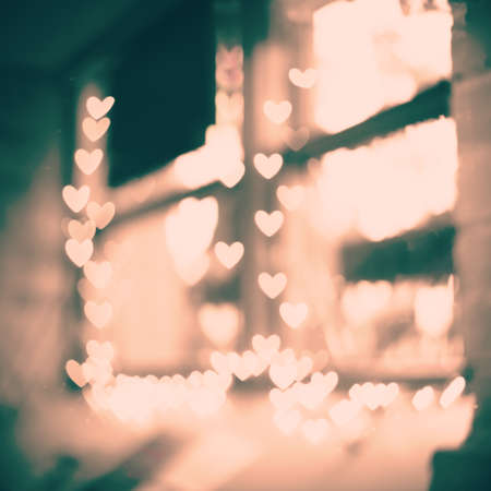 Cafe window with heart shaped bokeh overlay