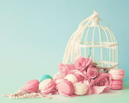 Pastel macarons and rosesの写真素材