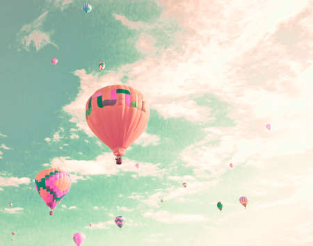 Vintage hot air balloons in flightの写真素材