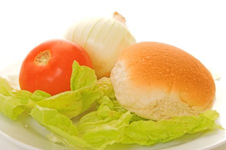 Eating a hamburger with everything on itの写真素材