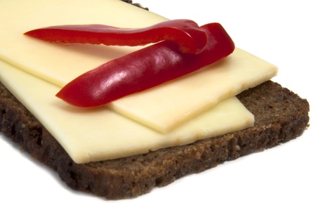 Sandwich with cheese and pepper on a white backgroundの写真素材