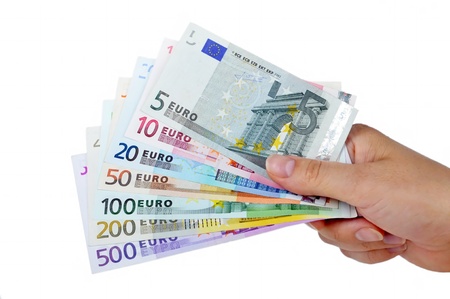 Money ih the hand  on white Background.