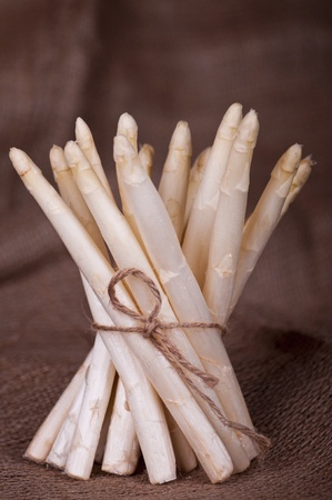 Asparagus on hessian rag backgroundの写真素材