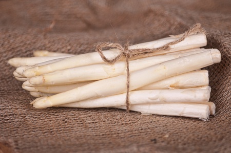 Asparagus on hessian rag backgroundの写真素材