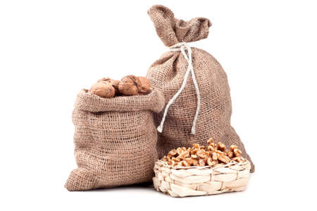 Walnut in a bag on a white backgroundの写真素材