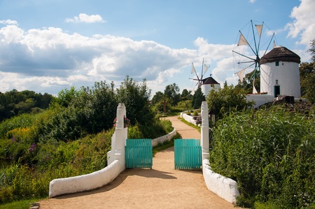 Mill in summer day against the skyの写真素材