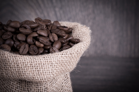 Coffee background with beans on a wooden backgroundの写真素材