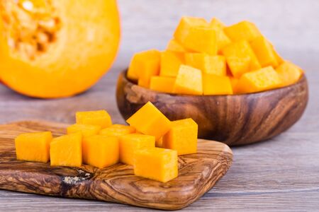 Fresh pumpkin on wooden backgroundの写真素材