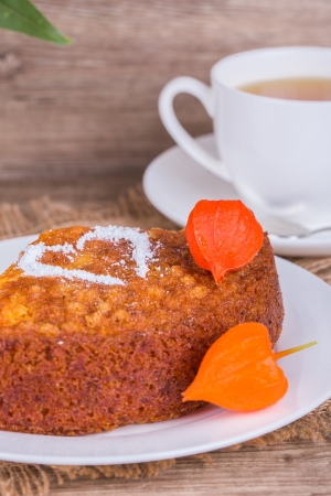 Fresh Homemade Pumpkin Pie with Physalis  on wooden backgroundの写真素材