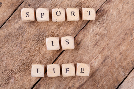 Sport is Life on Cubes on wooden backgroundの写真素材