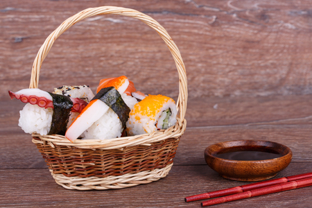 Sushi rolls set on a wooden backgroundの写真素材