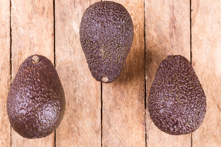 fresh healthy avocado on a wooden background