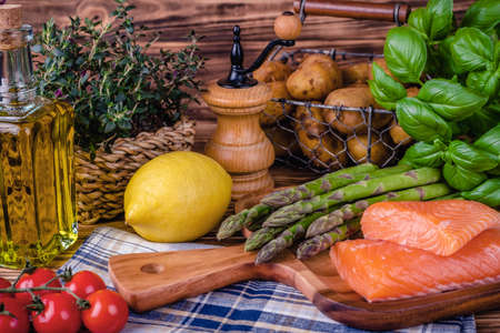 Set of fresh products for healthy food on wooden tableの写真素材