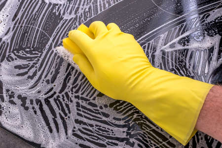 Cleaning the glass surface of the electric stove.の写真素材