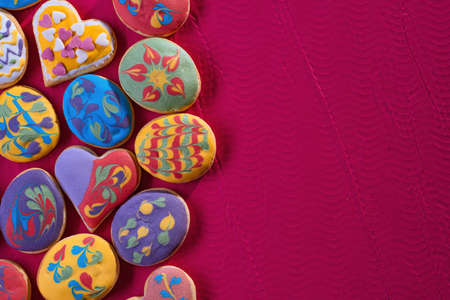 Homemade, freshly baked and decorated, colorful Easter biscuits cookies. Top view.