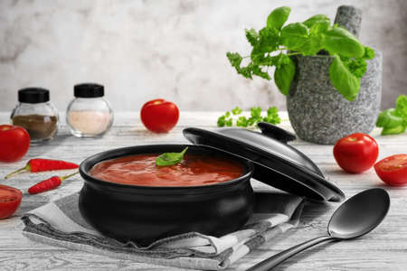 Traditional tomato cream soup and food ingredients.の写真素材